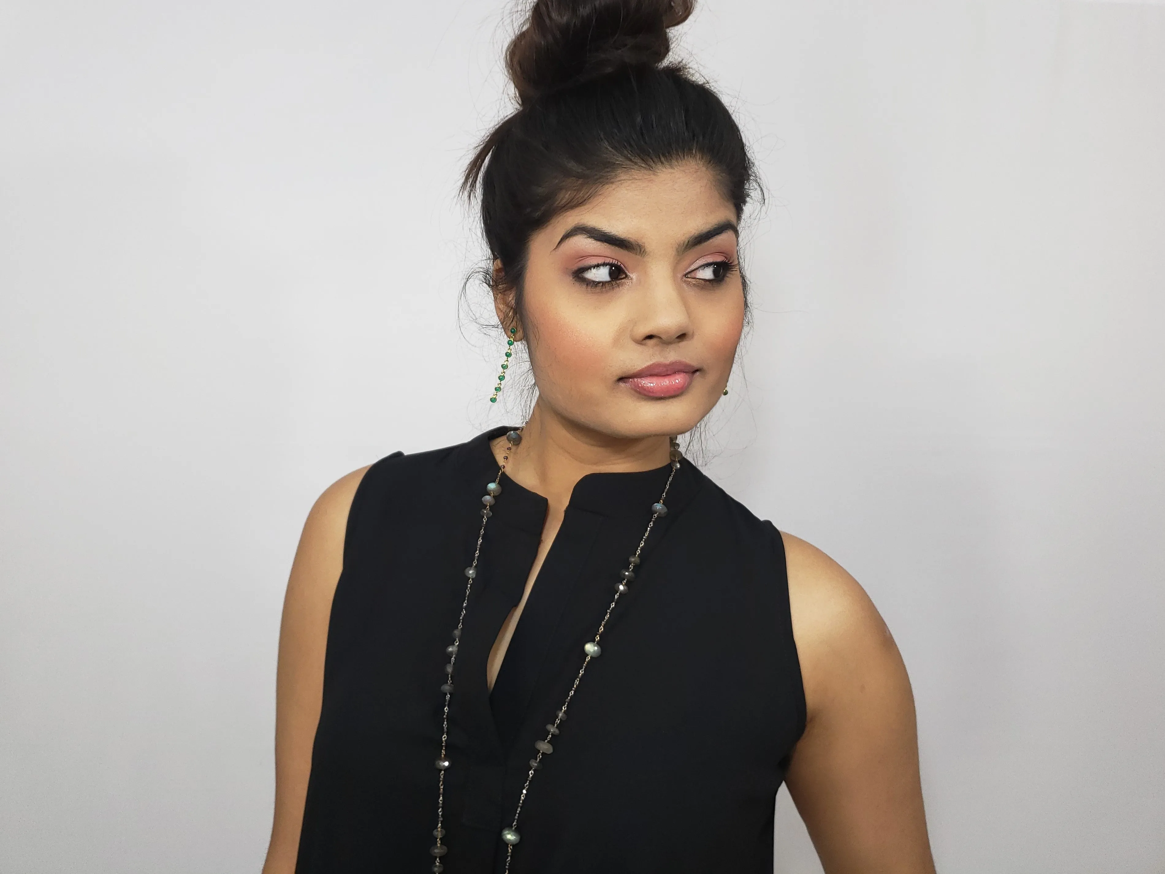 Taszeena Hi Low Split Neck Blouse in Black